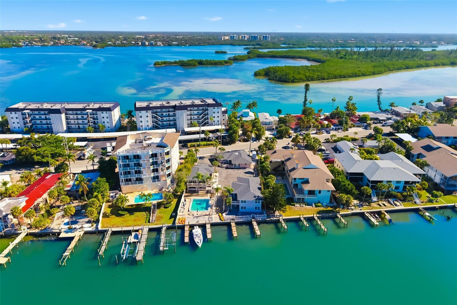 Siesta Key Waterfront 9 Unit Building + 8 Big Slips For Sale - $5,995,000 Siesta Key Waterfront 9 Unit Building + 8 Big Slips For Sale - $5,995,000