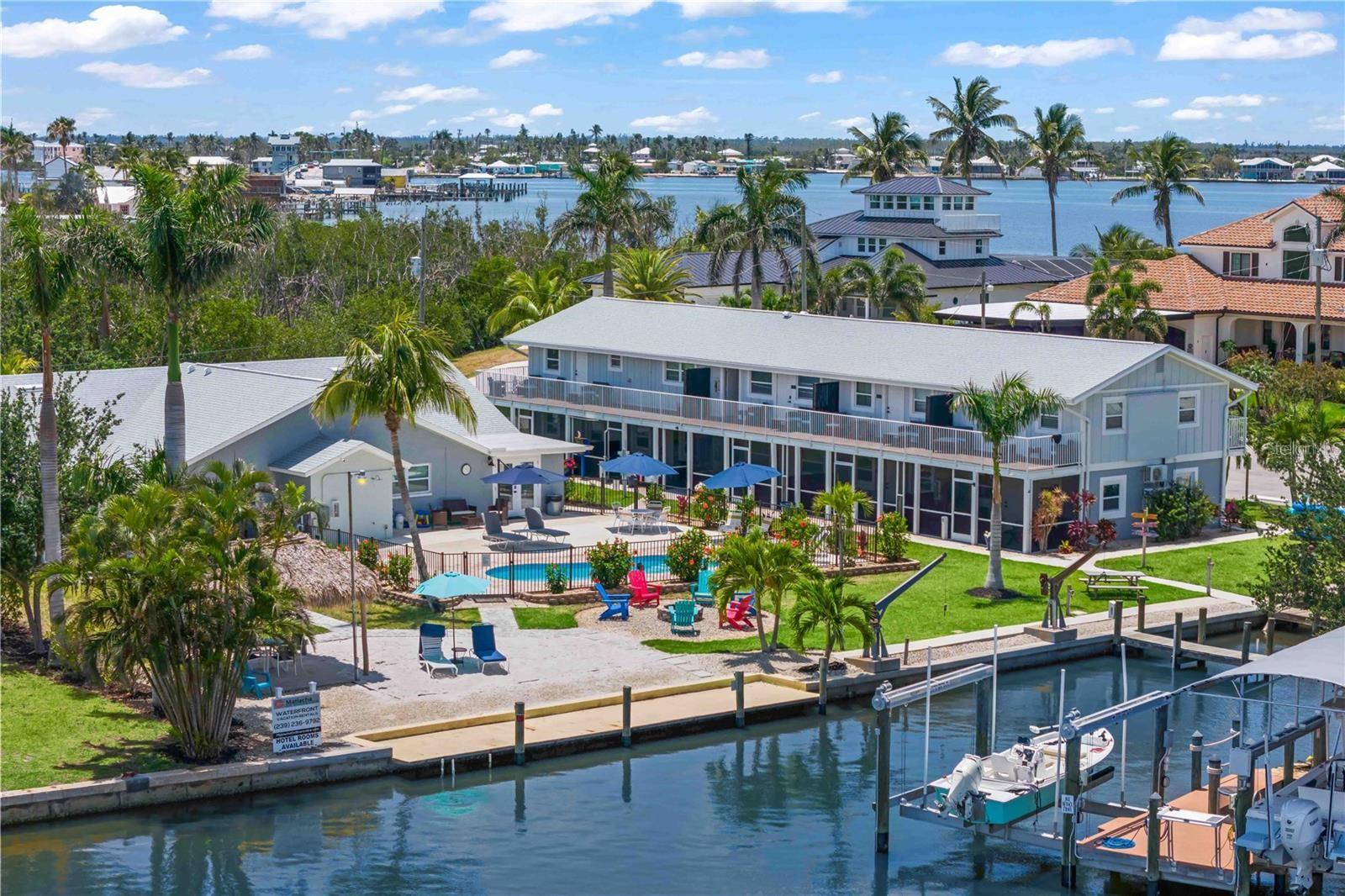  12 Hotel Rooms and 5 Boat Slips For Sale in Matlacha, FL $3,250,000